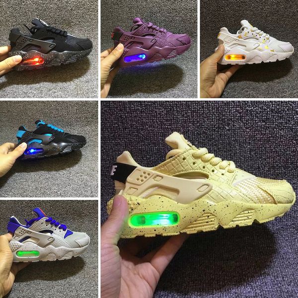 nike air huarache run mid kids gold