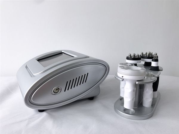 

new protable radiao frequency and vacuum rf beauty machine for skin tightening weight loss silmming machine, Black;white