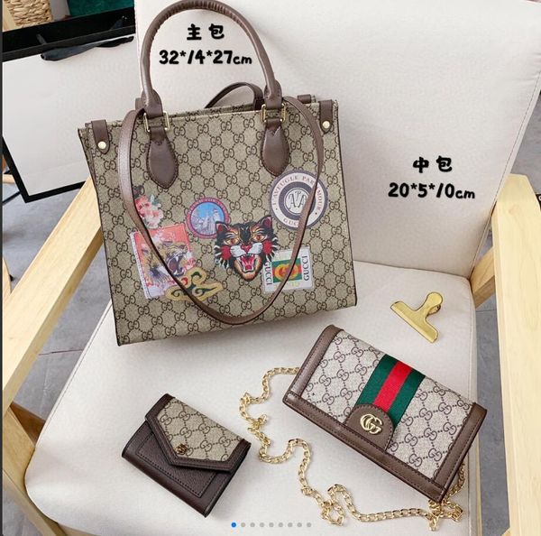 

2020 new high-quality ladies handbag women's new classic leather cartoon tiger three-piece wallet ladies shoulder bag backpack