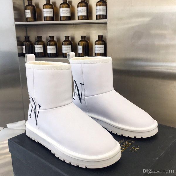 

winter new classic waterproof leather snow boots female short tube flat bottom boots warm black white thickened plus velvet cotton shoes