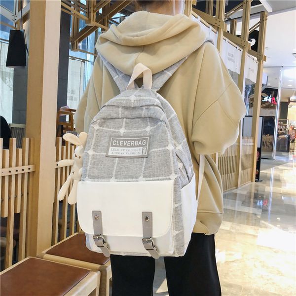 

2020 new student bag ms. canvas backpack large capacity korean lattice junior high school backpack