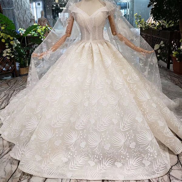 

2019 latest lebanon tassel wedding dresses shining crystal sequins v neck long sheer veil exquisite applique luxury garden bridal gowns, White