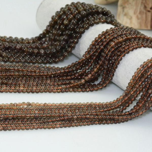 

natural mid quality cat's eye flash scapolite loose round beads 4-4.5mm / 6.5-7mm