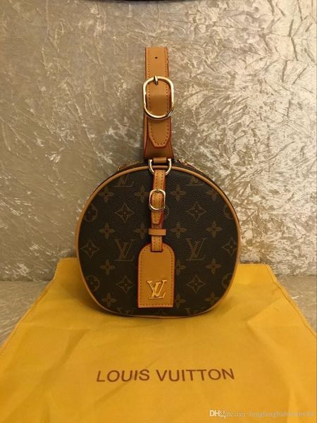 

2019 new printed leather portable small round bag retro messenger shoulder mini makeup bag tide