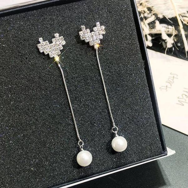 

Long love pearl earrings Korean temperament personality student girl Earrings simple Tassel
