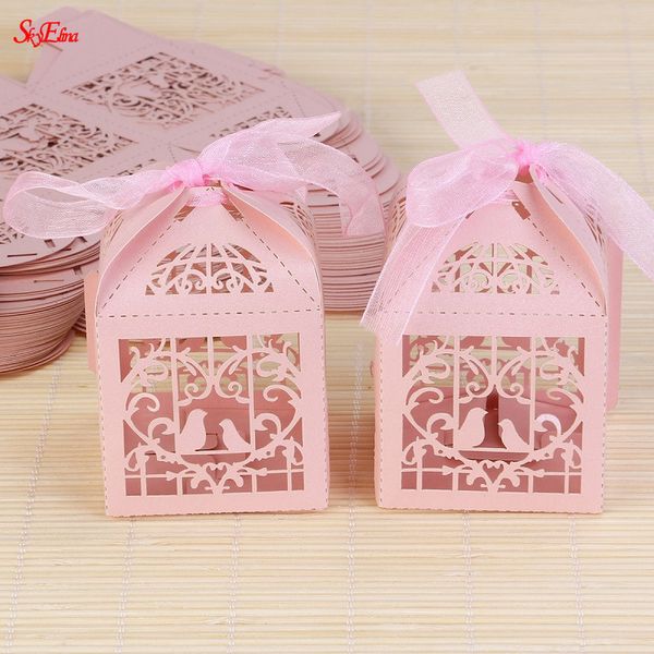 

2019 50pcs new love heart bird deluxe party wedding favor laser cut pearl paper ribbon candy boxes gift box classical 6z sh110