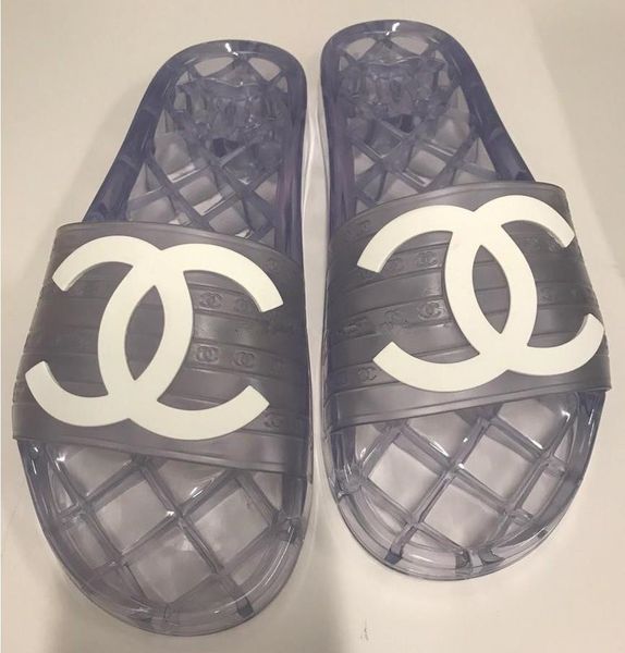 

Branded women oft pvc indoor lipper fa hion man letter print lip on rubber ole flat lide andal
