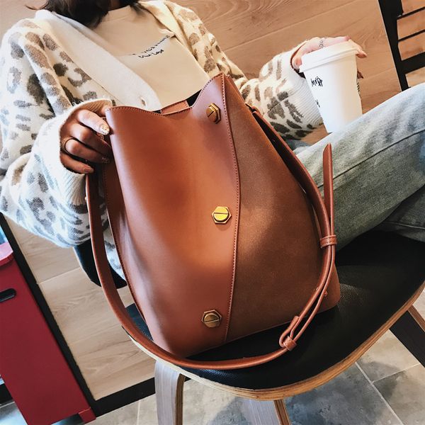 

new ladies shoulder bag pu autumn and winter korean version of rivet simple large capacity diagonal cross portable bucket bag