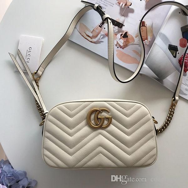 

Роскошные сумки Crossbody сумки металлические кнопки сумки мешок плеча женщин реальная кожа светская размер дамы сумки бренда: 24 * 13 * 7см