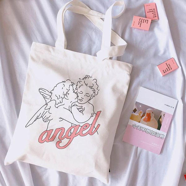 

angel new female college canvas shoulder bag fashion casual letter cartoon print large capacity white totes print bags