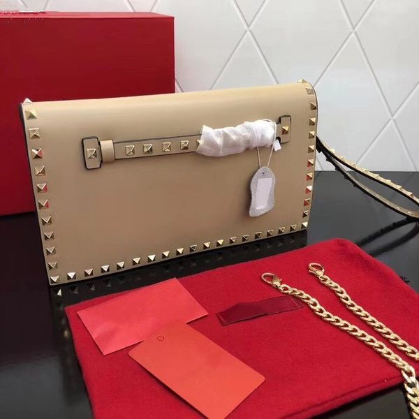 

2019 explosion women's studded clutch, women's solid leather crossbody bag, platinum studs and metal, detachable studded wrist str