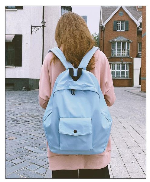 

2020 new simple and stylish portable large capacity canvas backpack female student wild backpack schoolbag