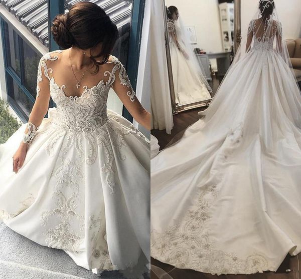 

luxury dubai wedding dresses a line jewel neck illusion long sleeves lace appliques beaded cathedral train plus size formal bridal gowns, White