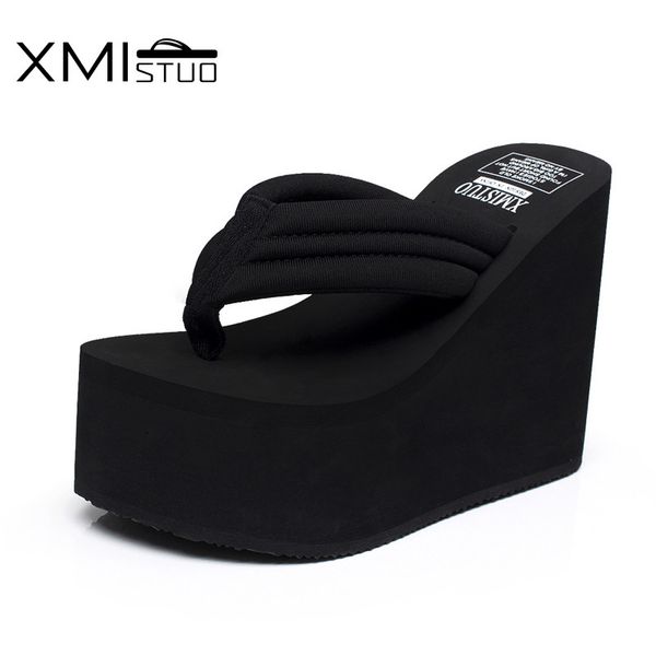 

xmistuo increased 12cm slope with thick crust muffin waterproof sandals and slippers slip female high with the simple flip-flops, Black