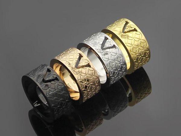 

europe and the united states titanium steel jewelry wholesale hollow v-shaped four leaf flower plaid ring couple carved ring, Golden;silver