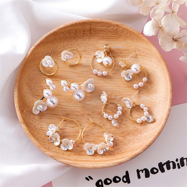 

korea fashion pearl ocher flower petals white shell earrings retro art fresh fresh sweet temperament cute woman earrings jewelry, Silver
