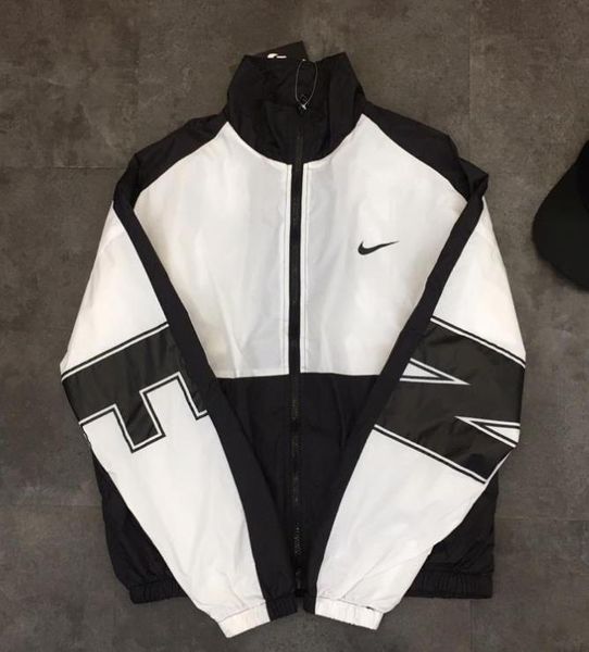 

Over ea fa hion port ca ual jacket wind creen jacket men and women lover coat color black ize m xxl