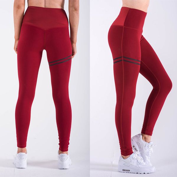 Nuovi pantaloni da fitness da yoga con stampa in plastica piatta con cuciture a righe da donna leggings sportivi casual in tinta unita