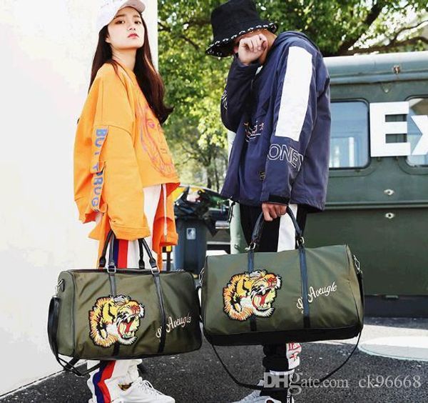 

50cm large capacity women travel bag famou cla ical de igner 2018 ale men houlder duffel bag carry on luggage keepall