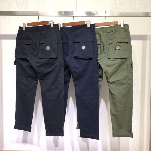 

Мужчины случайных спортивной моды джинсовых брюки sweatpant свободно хлопок удобных качеств ткани письма OEM кнопка груз Beam футовых брюки
