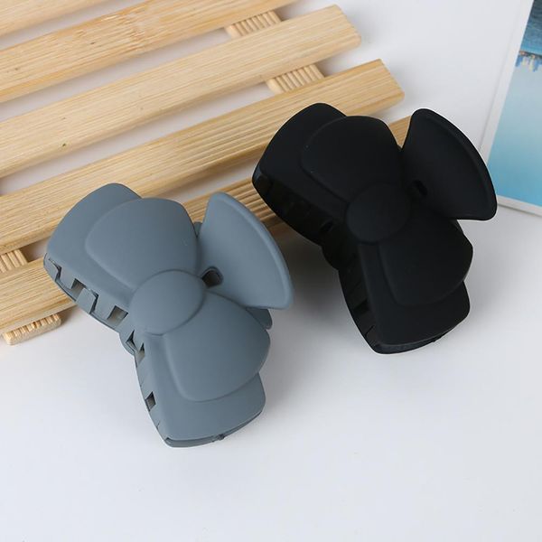 

2pcs solid color fashion bowknot shape women hair claw clip gripper barrette new