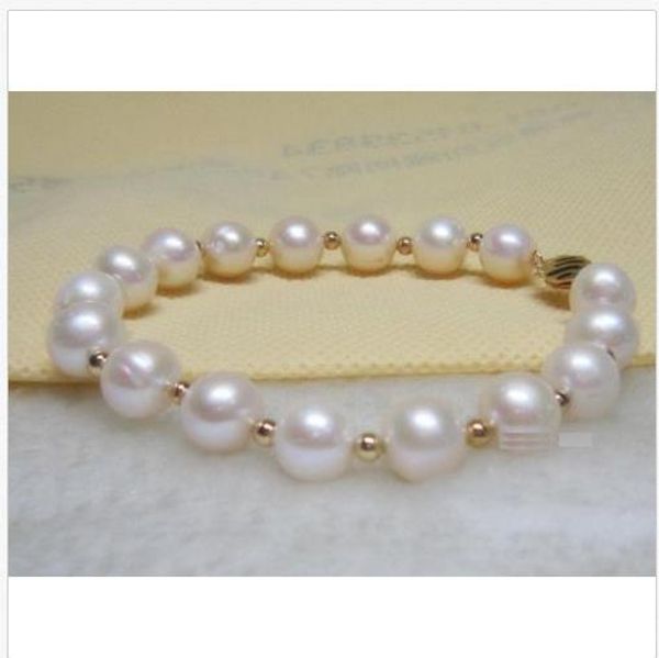 

huge 10-11mm south sea white pearl bracelet 7.5-8"14k gold clasp, Black