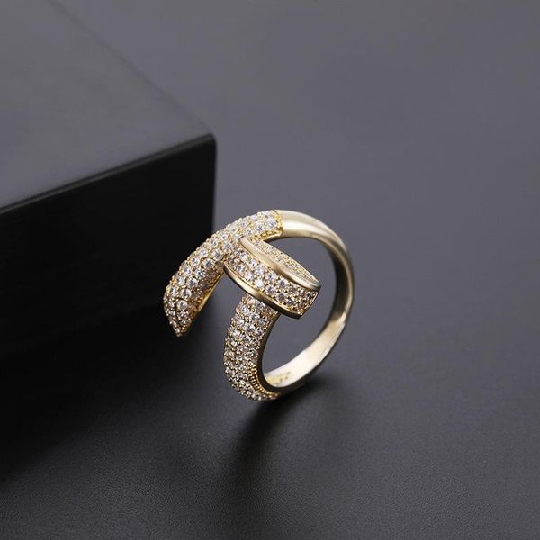 

новая мода позолоченное кольцо личность альтернативный дизайн ногтей микро-инкрустированный циркон открытие кольцо мужчина женщина кольцо юв, Golden;silver