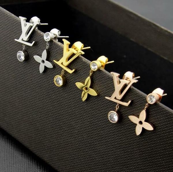 

Делюкс леди женщины моды из нержавеющей стали 316L 18K золото Роза серебро цветок алмаз письма болтаться серьги для девочек тонких ювелирных изделий оптом