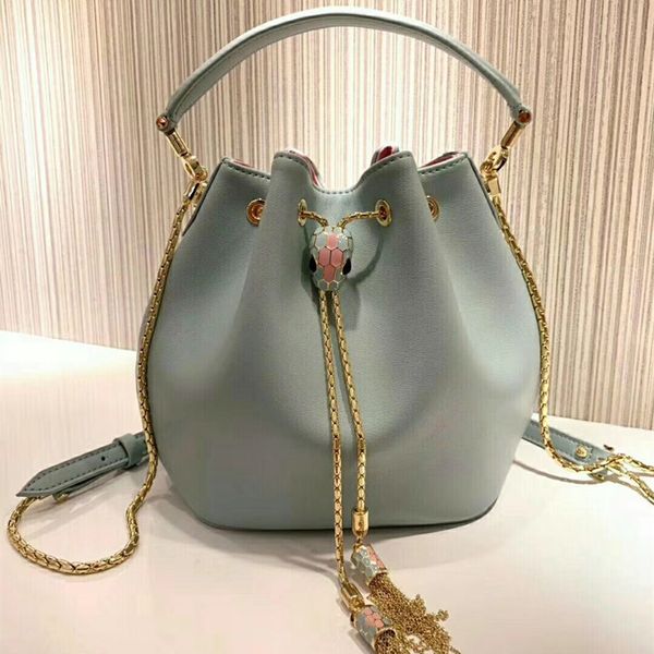 

2019 enamel snake baotou layer cowhide tassels bucket package single shoulder satchel genuine leather woman package tide