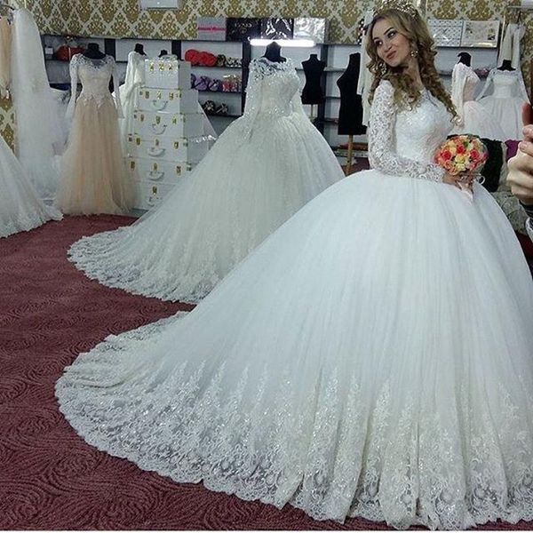

luxury ball gown wedding dresses long sleeve modest jewel neckline drop waist shiny crystal bling arabic dubai bridal gowns real images, White