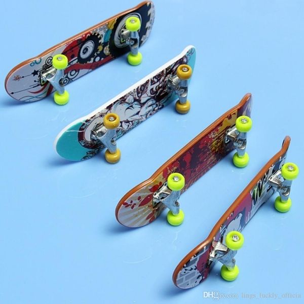 

professional type bearing wheels skid pad maple mini skateboardsalloy stent bearing wheel fingerboard toys random color