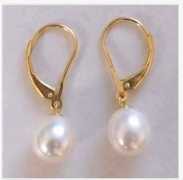 

natural 10-11mm white south sea pearl earrings 14k gold clasp, Silver