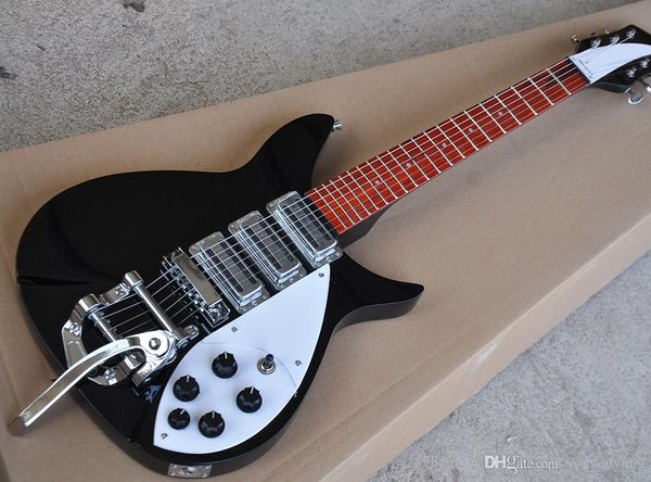

black short electric guitar chord with white pickup, rosewood scale, vibrato system, custom service