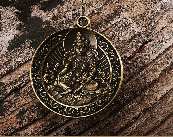 

tibetan copper engraved vaishravana (yellow jambhala) amulet pendant, Silver