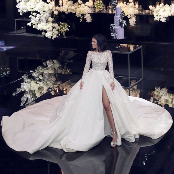 

stylish beaded lace backless wedding dresses bateau neck a line long sleeves side split bridal gowns sweep train taffeta robe de mariÃ©e, White