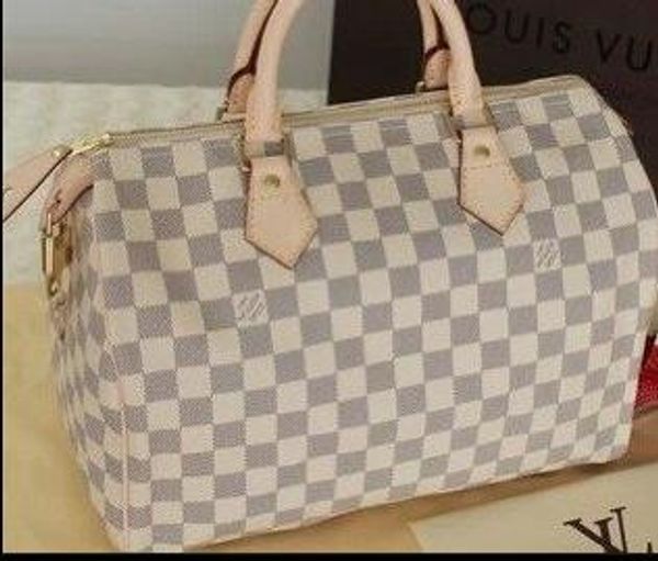 

2019european and american fa hion men and women de igner handbag ladie pillow bag