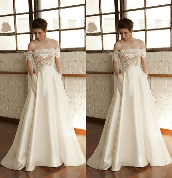 

2019 a line country wedding dresses off the shoulder lace appliques short sleeves bridal gowns with pocket custom made vestidos de novia, White