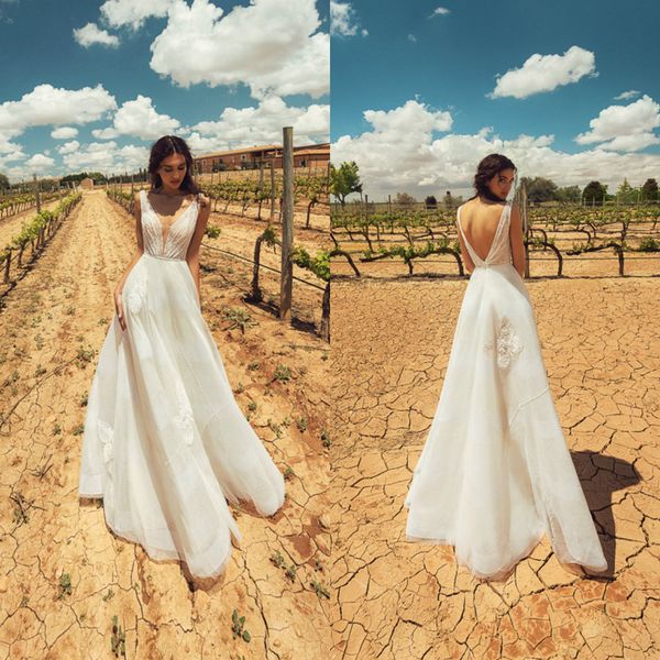 

2020 lace wedding dresses deep v neck sleeveless appliques bridal gowns backless sweep train a line wedding dress robe de mariee, White
