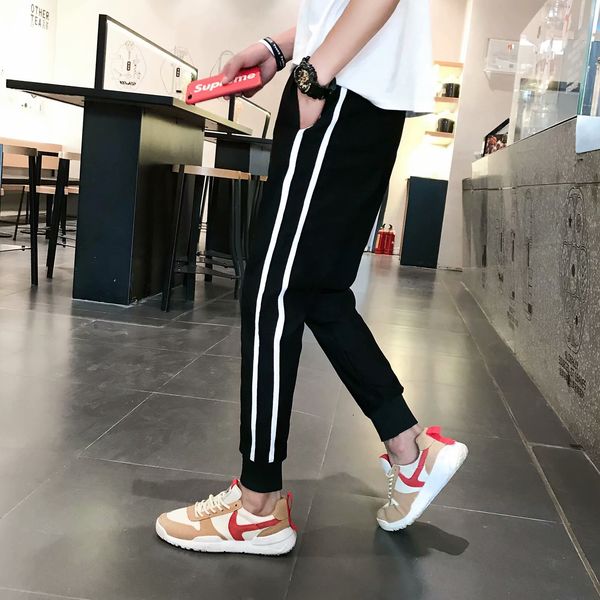 

Januarysnow Students' casual Capris Korean pants men's trend all kinds of sports casual pants slim leggings large pants