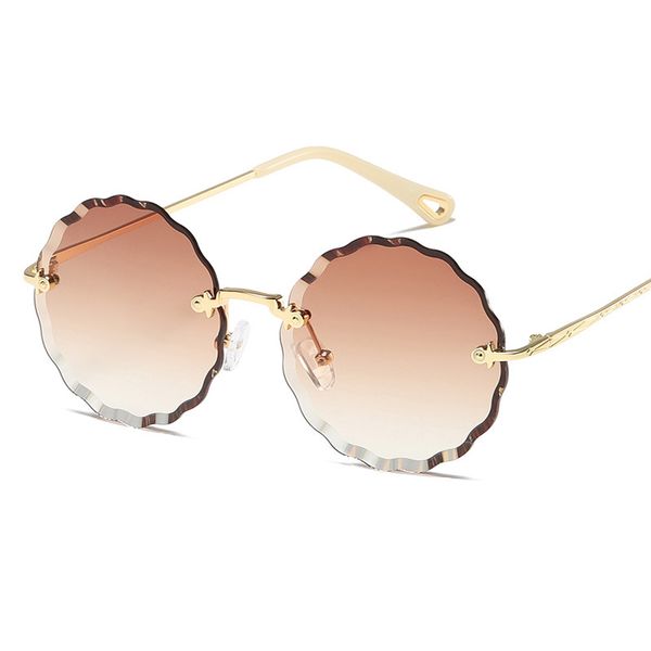 

new frameless trimming fashion polygon round sunglasses women sunglasses flower shaped europe and america glasses, White;black