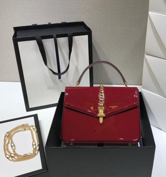 

casual style the imported first layer patent genuine leather big size l26cm*w7cm*h20cm three colors women tote handbags