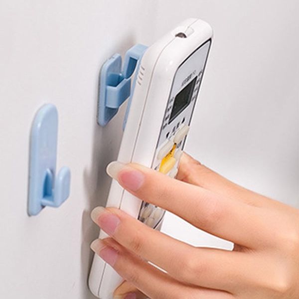 

2pcs remote control sticky hook set tv air conditioner remote control wall hanging storage holder stand space saving organizer hooks rails