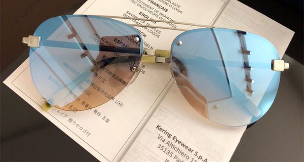 

wholesale-men women sunglasses uv protection lens 1019 fashion oval coating mirror lens frameless color plated frame come with package, White;black