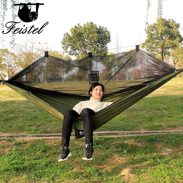 

green mosquito nets hammocks, camps sleeping beds, easy to carry outdoor furniture