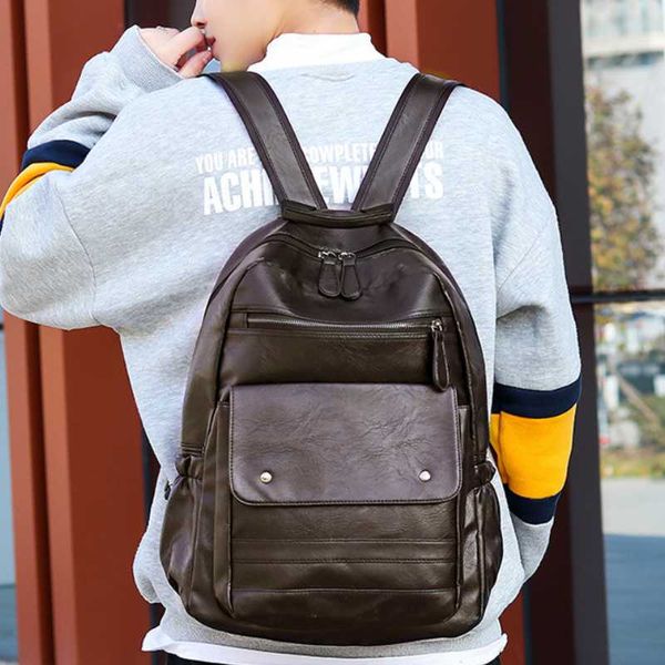 

2020 new solid color black large capacity pu leather backpack fashion trends backpack schoolbag student bag