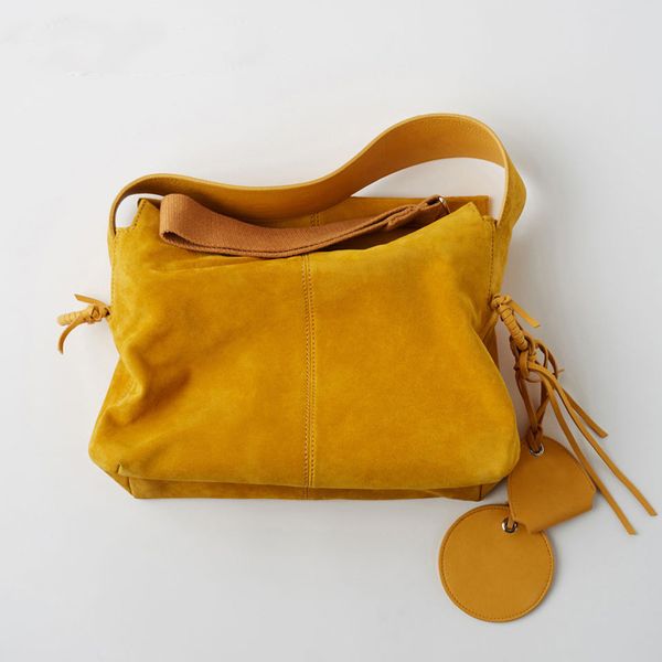

vintage scrub shoulder bag fashionable new women's handbag wide shoulder strap tassel messenger bags party clutch