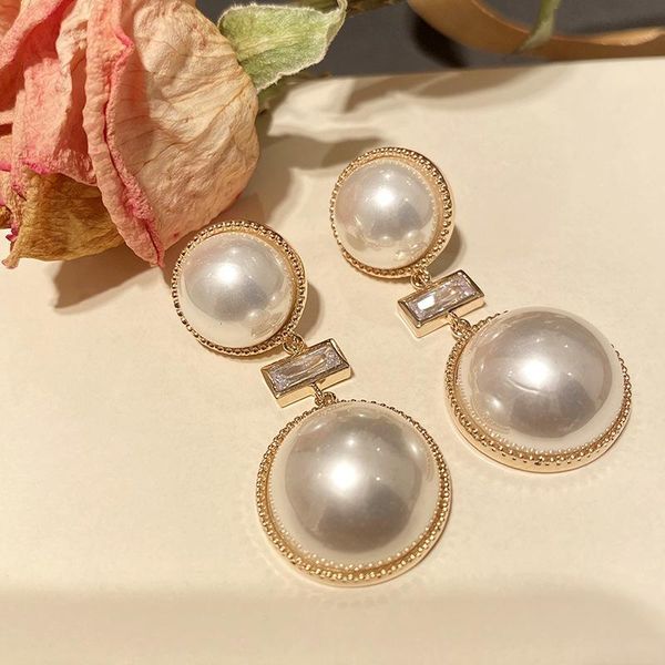 

2020 designer pearl earrings female senior atmosphere exaggerated earrings super large pearls show face thin earrings ins simple style