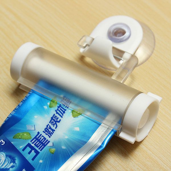 

toothpaste dispenser tube press holder