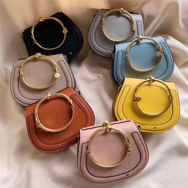 

mini leather slant bag single shoulder bag round metal bracelet perfact decoration size:19/15/6.5 cm luxury handbags hot