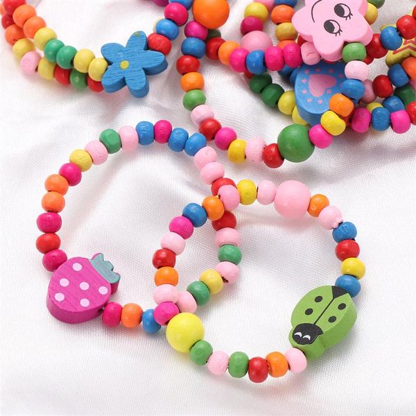

12pcs cute natural wood bracelet kids party gift elastic wooden beads bracelet children girls birthday party favors supplies a35